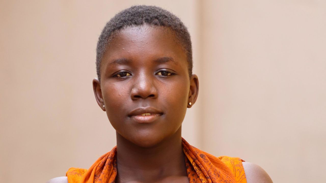 Fortunate Ayomirwoth, a 15-year-old girl in Kampala, Uganda, who says "I miss school"