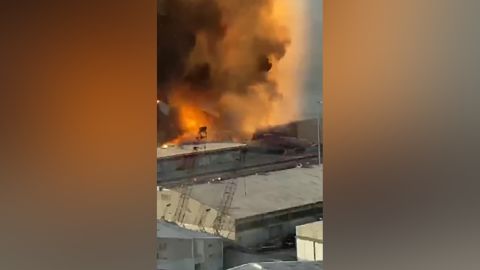 A screenshot from Lina's video showing the start of the second explosion, which leveled the port and caused widespread damage.
