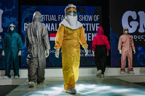 Medical workers in Yogyakarta, Indonesia, showcase designs during a fashion show of personal protective equipment on August 1. The fashion show was held as a form of gratitude for all medical personnel who have been fighting Covid-19.
