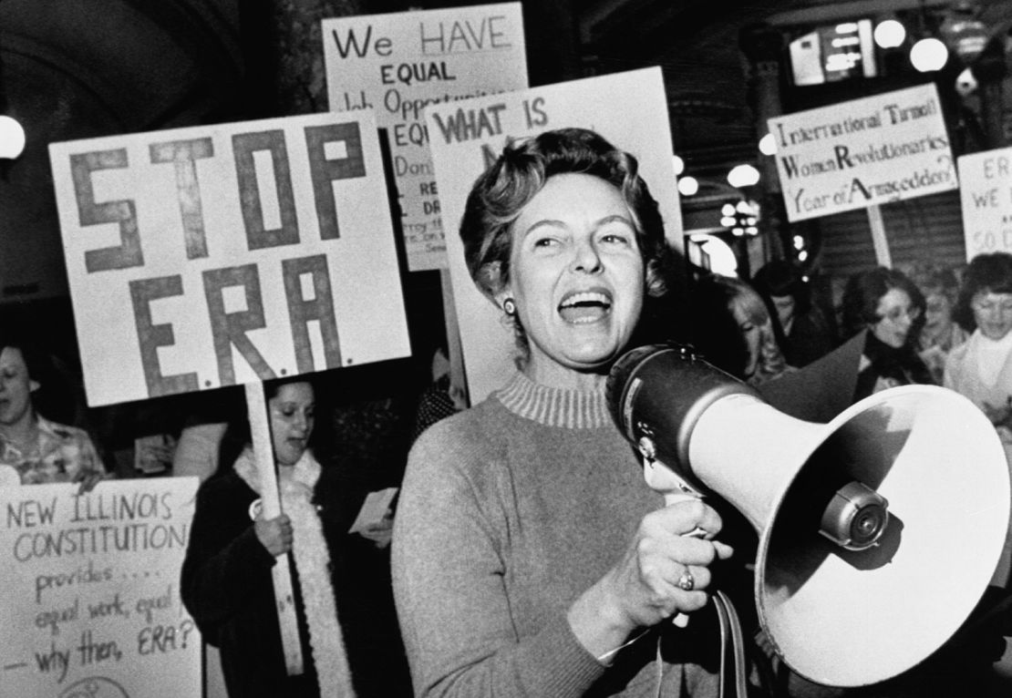 Stop ERA national Chairman Phyllis Schafly leads members opposed to the equal rights amendment in song