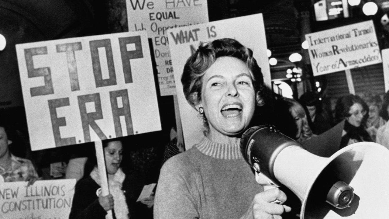 Stop ERA national Chairman Phyllis Schafly leads members opposed to the equal rights amendment in song