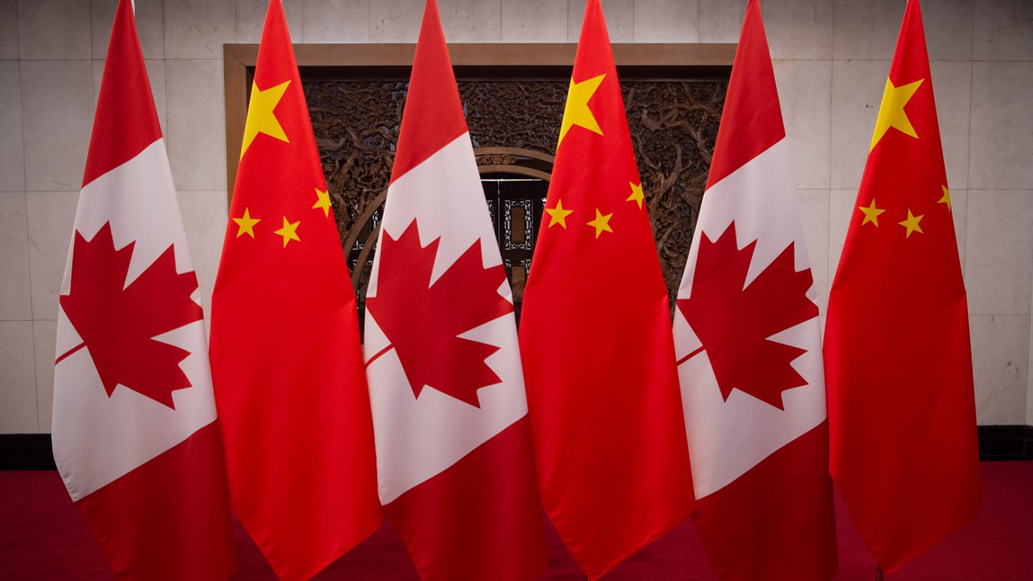 Canadian and Chinese flags are seen at the Diaoyutai State Guesthouse on December 5, 2017, in Beijing, China. 