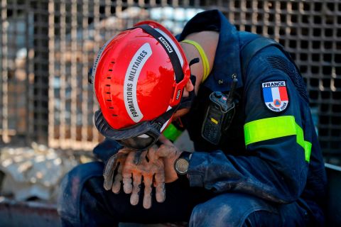A French rescue worker rests on August 7, 2020.