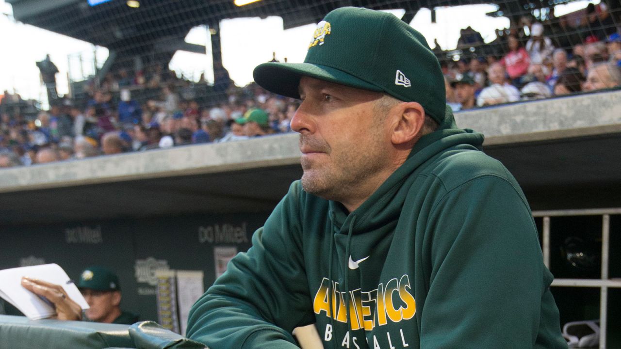 Oakland A's bench coach Ryan Christenson apologized for giving an apparent Nazi salute to players after a game on Thursday. 