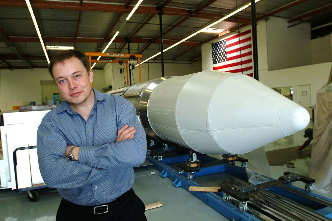 Elon Musk stands beside a rocket on March 19, 2004 in El Segundo, Los Angeles, California. 