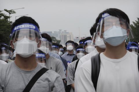 Resident doctors and interns attend a rally in Seoul, South Korea, on August 7. They were protesting the government's plan to expand admissions to medical schools — a policy meant to address a shortage in physicians.