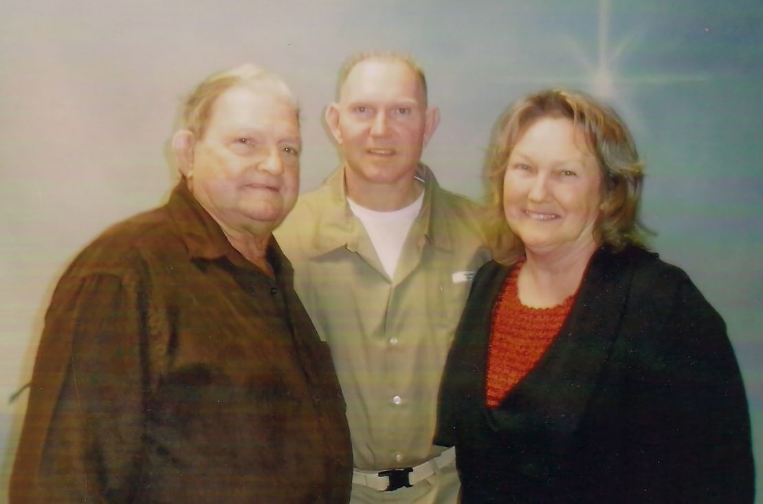 Bobby Williams, center, an inmate at FCI Seagoville who has tested positive for coronavirus, with his parents, Bobby and May Belle, in 2012.