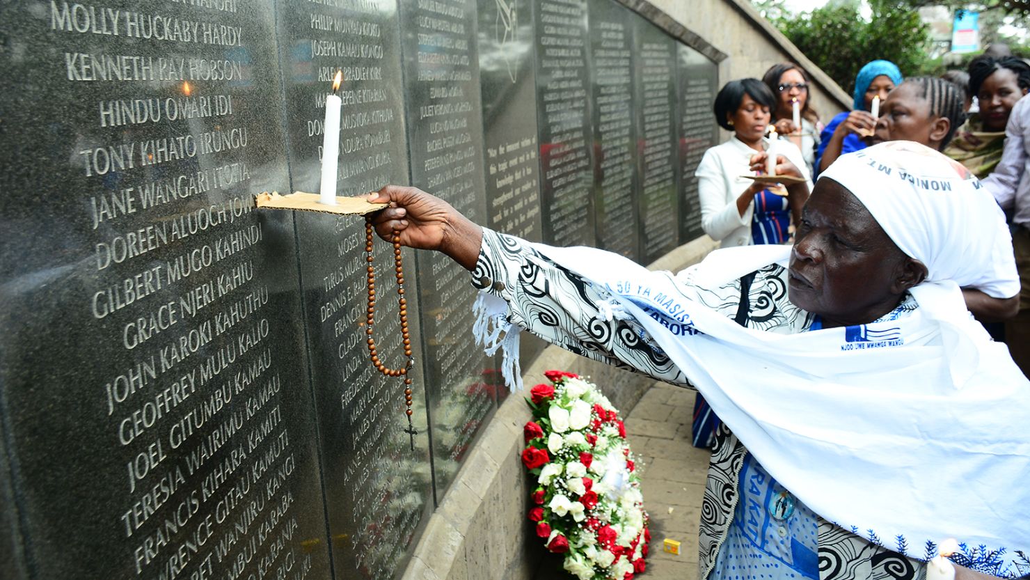 NAIROBI, KENYA - 2019/08/07: Margaret Achieng who lost her daughter to the August 7, 1998 bombing of US Embassy in Nairobi seen praying at the August 7th Memorial Park.
