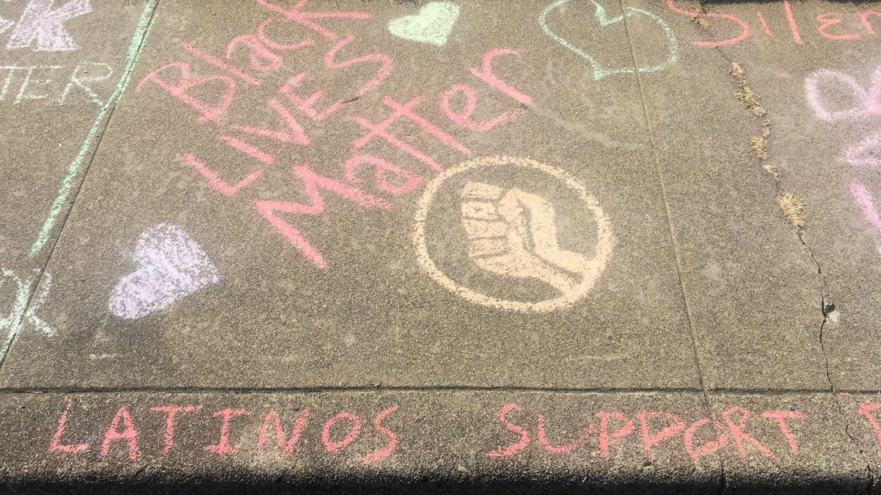 A message written by a neighbor outside Manette Sharick's home.