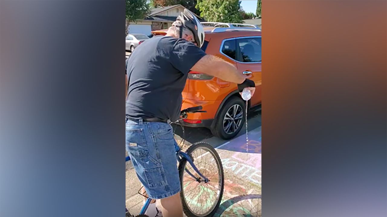 Manette Sharick says she saw a man she says she never met pouring water over her daughter's "Black Lives Matter" chalk drawing.