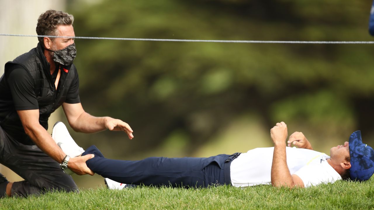 Defending champion Brooks Koepka received treatment for a sore hip during the second round at TPC Harding Park but is still within two shots of the leader after a two-under 68.