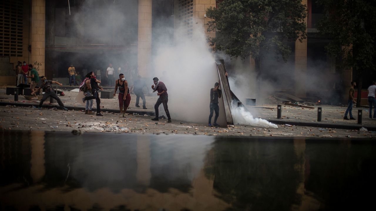 Protesters defy riot police in front of Le Gray Hotel in downtown Beirut.