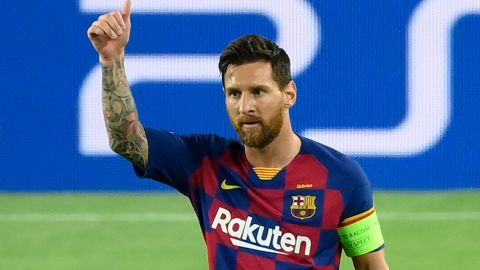 Lionel Messi celebrates after scoring Barcelona's brilliant second goal against Napoli in the Champions League last 16 second round tie in the Camp Nou.