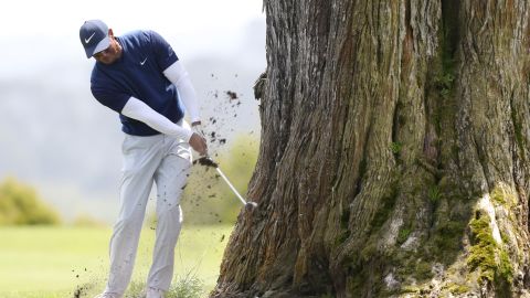 Tiger Woods saw his chances of winning a 16th major all but disappear with a third round 72 to trail leader Dustin Johnson by 11 shots.