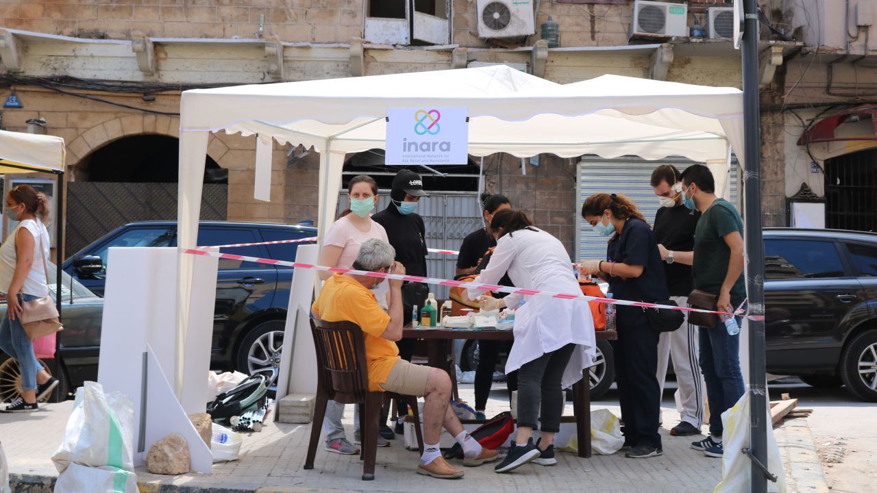 People injured in the protests or during the clean-up operation are offered medical help at a stand run by the NGO Inara.