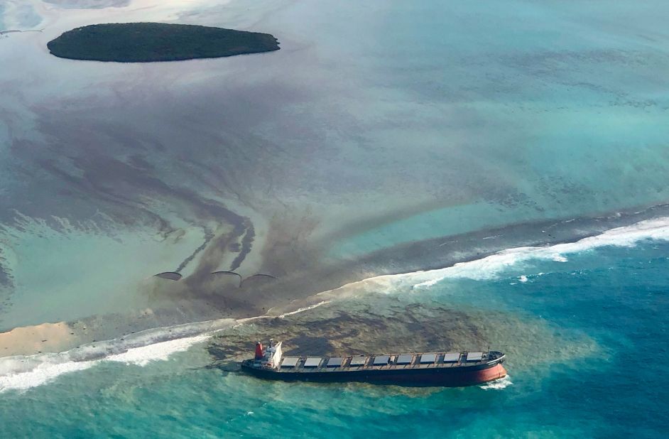 The wrecked ship and its leaking oil are seen from the air on August 7.