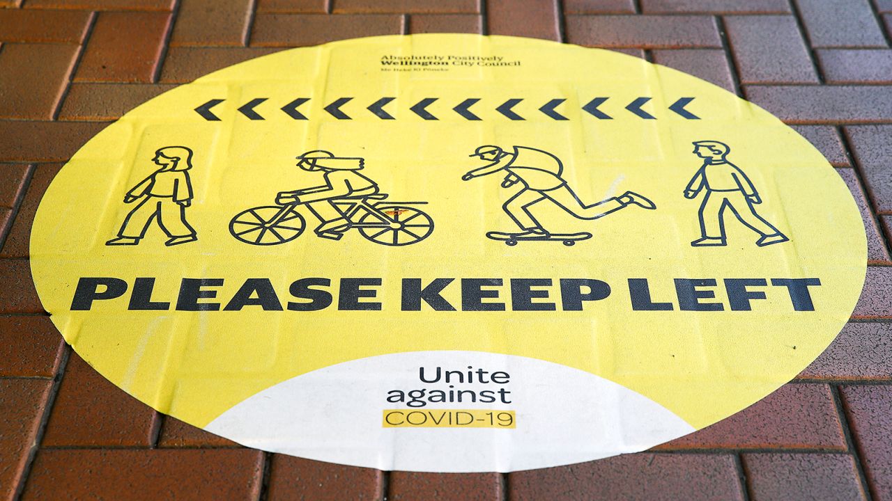 Social distancing signage remains on a footpath in the CBD during the first day under Covid-19 Alert Level 1 on June 9, 2020 in Wellington, New Zealand.