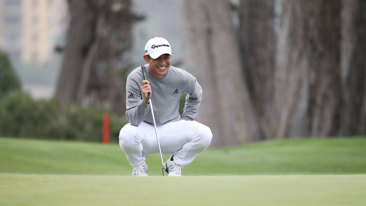 Collin Morikawa lines up a putt for eagle on the 16th hole. 