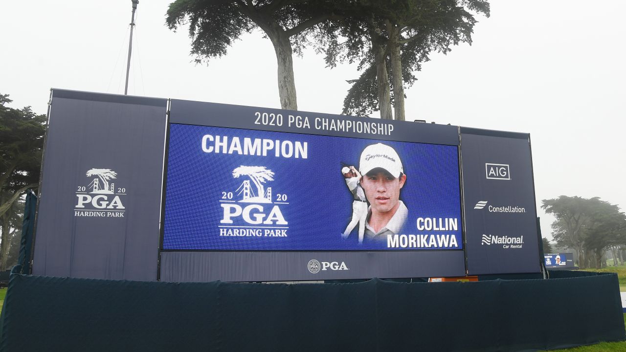 Morikawa is congratulated on a leaderboard after winning the 2020 PGA Championship.