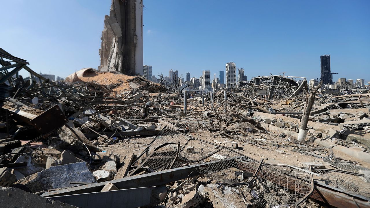 TOPSHOT - A picture shows the devastated Beirut port on August 7, 2020, three days after a massive blast there shook the Lebanese capital. - The explosion of a huge pile of ammonium nitrate that had languished for years in a port warehouse served as shocking proof to many Lebanese of the rot at the core of their system, with seething anti-government protests erupting late Thursday near parliament. World leaders have joined the chorus of Lebanese in the country and abroad demanding an international probe into a blast that killed nearly 150 and wounded at least 5,000 people. At least 300,000 were left temporarily homeless, including nearly 80,000 children, the United Nations' child agency has said, warning that many have been separated from their families. (Photo by JOSEPH EID / AFP) (Photo by JOSEPH EID/AFP via Getty Images)