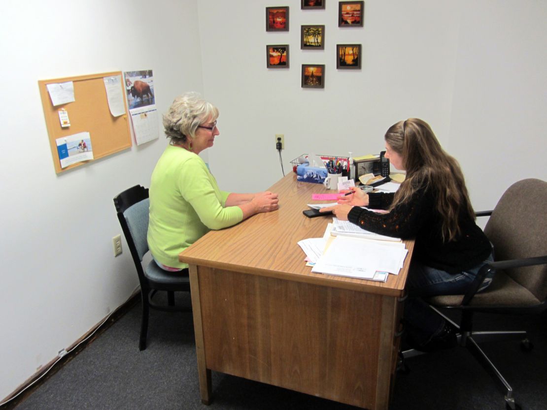 Mary Mason (left) is the director of Inter-Faith Response, which provides aid to tenants at risk of eviction in Council Bluffs. She is shown here with a volunteer.
