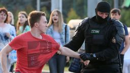 Law enforcement officers detain a participant in a protest against the results of the 2020 Belarusian presidential election.
