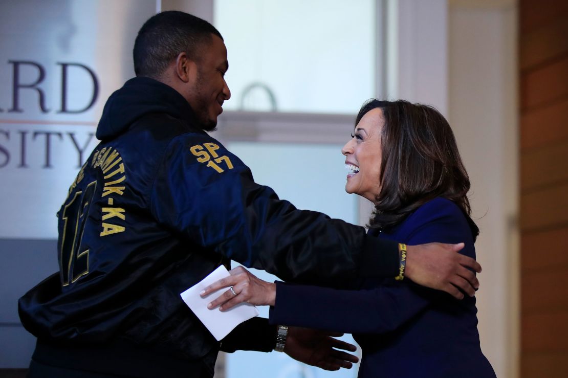 Sen. Kamala Harris hugs Amos Jackson III, Howard University Student Association president, after speaking at her alma mater in January 2019.