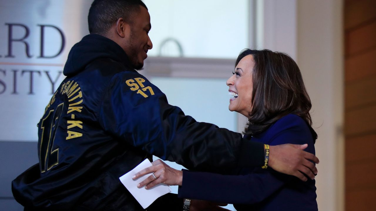 Sen. Kamala Harris hugs Amos Jackson III, Howard University Student Association president, after speaking at her alma mater in January 2019.