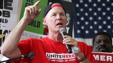UNITE HERE International President D. Taylor (center) speaks during a June 2019 protest in support of airport workers at Ronald Reagan International Airport in Washington D.C.