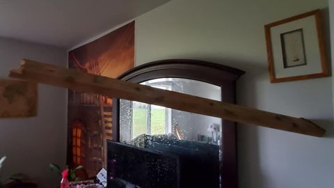 Boards pierced through walls of a home as the derecho passed through Iowa.