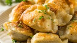 Pierogi - filled dumplings that can be cooked or fried, stuffed with meat, vegetables, cheese, fruits, chocolate, accompanied by a sour cream topping or just butter.