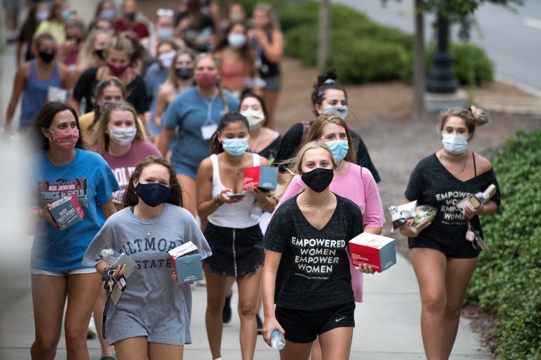 College students walk to dinner this week at the University of South Carolina in Columbia. 