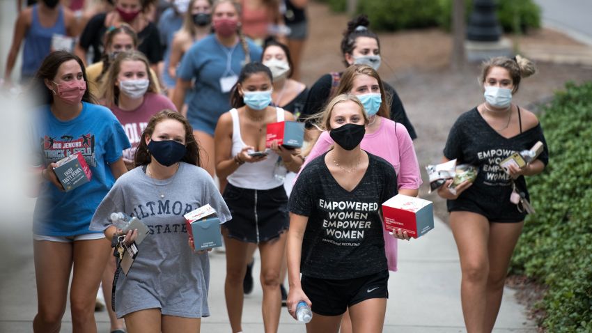 COLUMBIA, SC - AUGUST 10: College students walk to dinner at the University of South Carolina on August 10, 2020 in Columbia, South Carolina. Students began moving back to campus housing August 9 with classes to start August 20. (Photo by Sean Rayford/Getty Images)