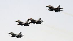 Four US-made F-16 fighter jets cross the sky during a drill near the Suao navy harbour in Yilan, eastern Taiwan, on April 13, 2018.
Taiwan's president watched naval drills simulating an attack on the island on April 13, days before Beijing is set to hold live-fire exercises nearby in a show of force. / AFP PHOTO / SAM YEH        (Photo credit should read SAM YEH/AFP via Getty Images)