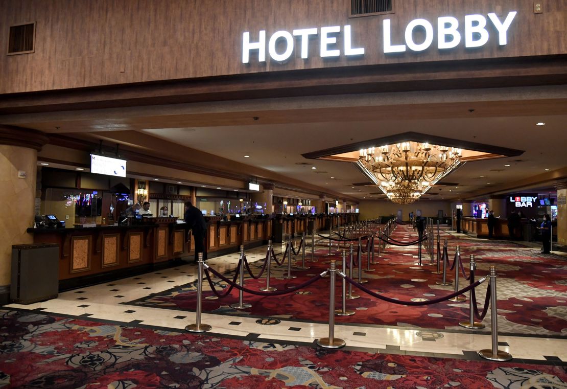 The hotel lobby and check-in desk at Excalibur Hotel & Casino are nearly empty shortly before the Las Vegas Strip property opened to guests for the first time in June since being closed in mid-March.