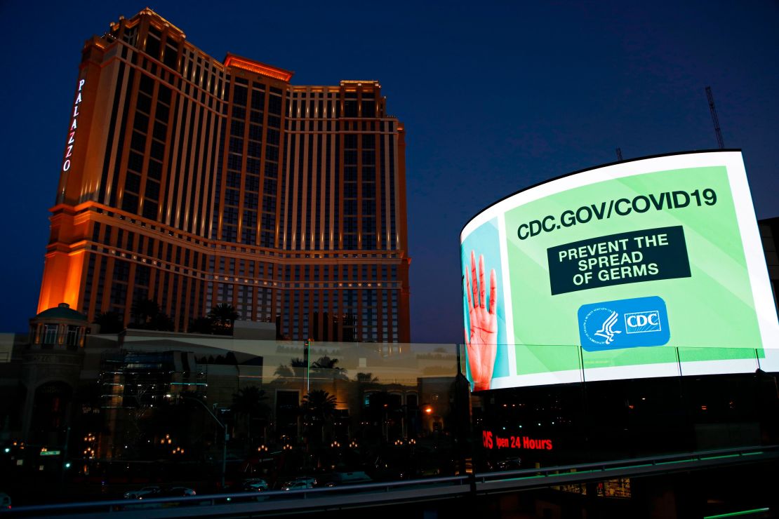 A sign advises people to minimize the spread of germs along the Las Vegas Strip, devoid of the usual crowds during the coronavirus outbreak.
