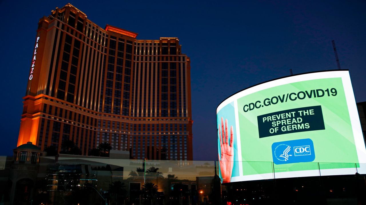 A sign advises people to minimize the spread of germs along the Las Vegas Strip, devoid of the usual crowds during the coronavirus outbreak.