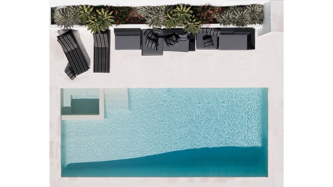 <strong>Escapism in a photo: </strong>Walls' shots might remind the viewer of a happy summer memory or offer a slice of escapism. Pictured here: a private pool in Sydney, Australia.
