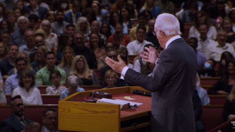 Pastor John MacArthur speaks during a July 26 service at Grace Community Church. CNN has blurred a portion of this image to protect a child's identity. 