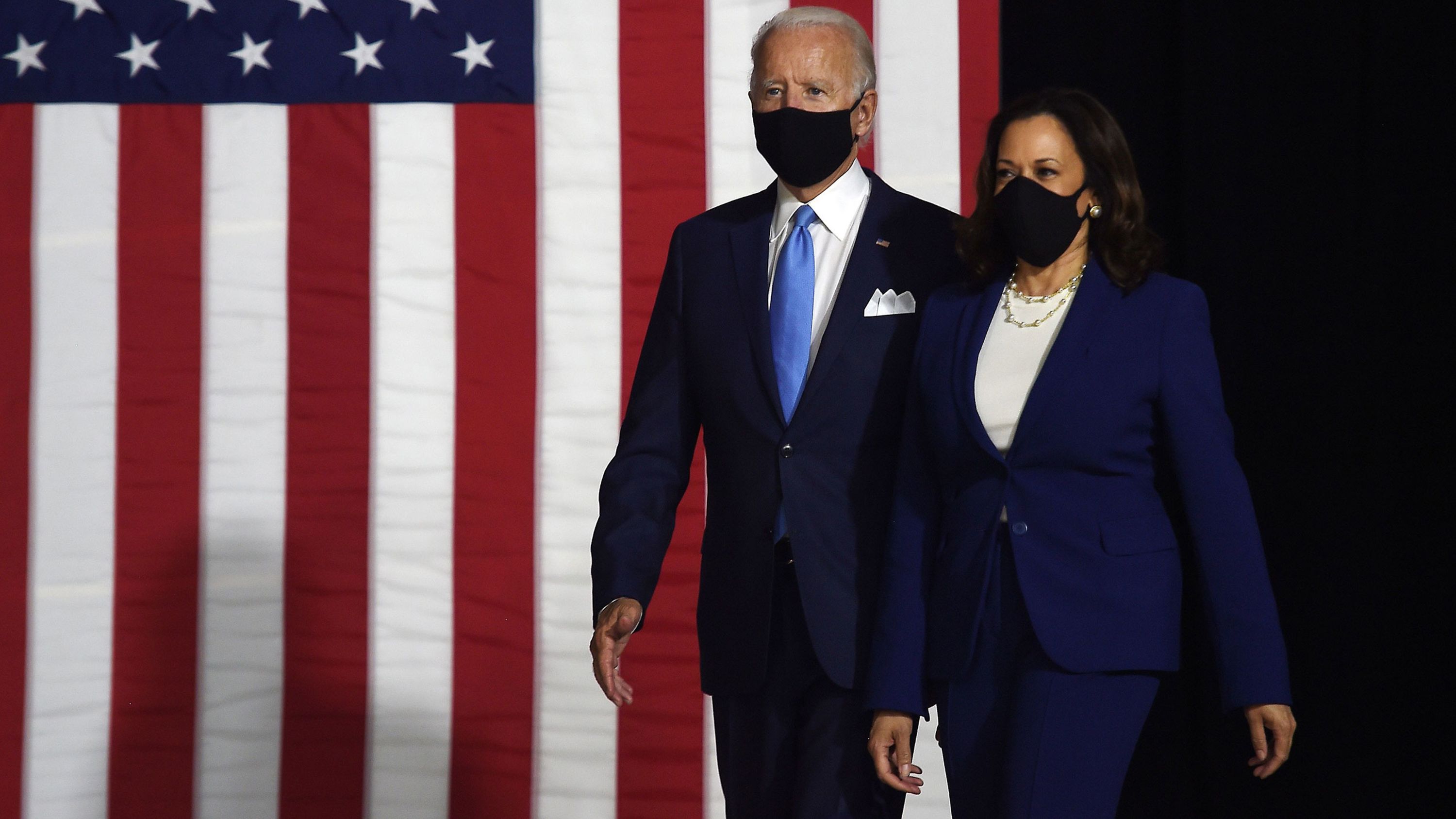 Joe Biden, the presumptive Democratic presidential nominee, walks out with his running mate, US Sen. Kamala Harris, on Wednesday, August 12.