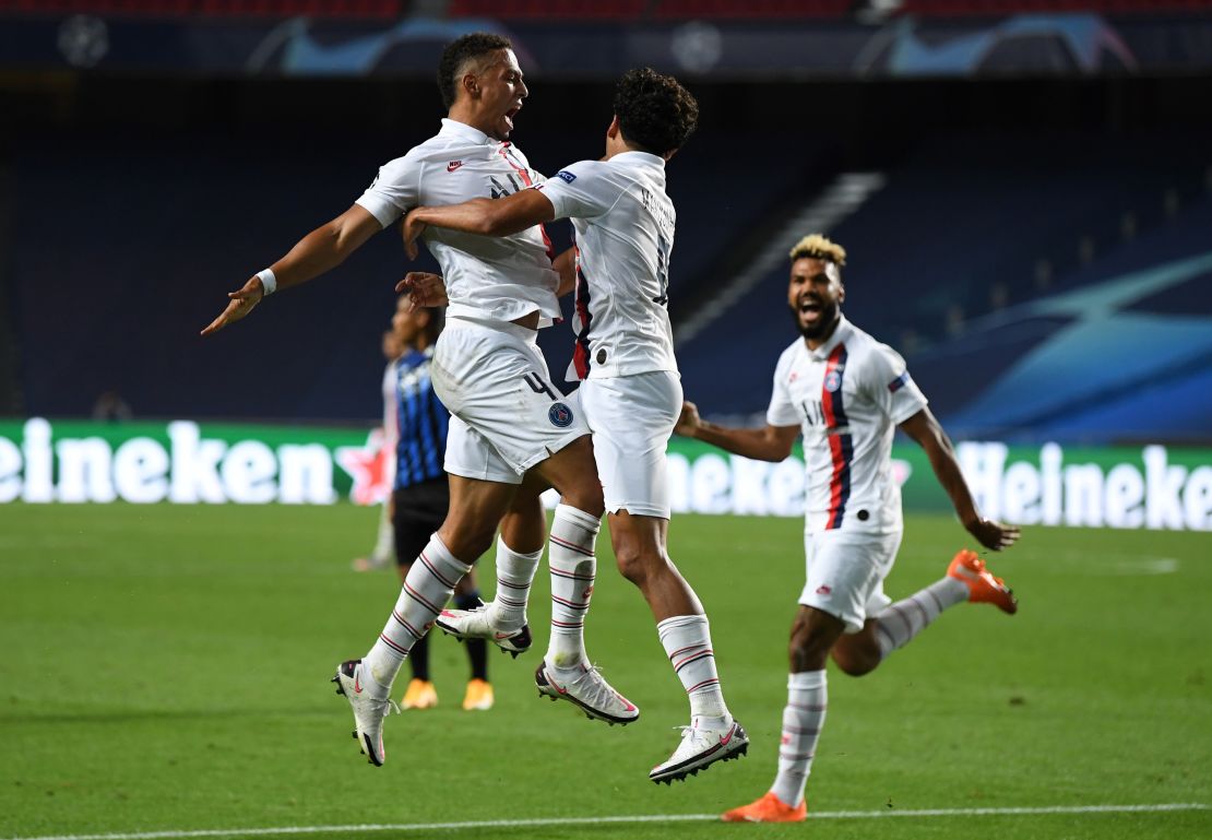 Paris Saint-Germain score two late goals to book its place in the semifinals.