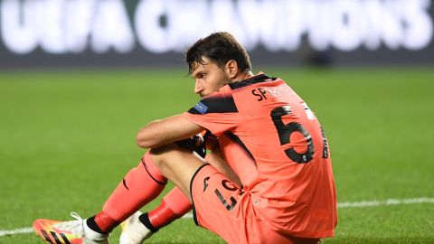 Atalanta goalkeeper Marco Sportiello slumps to the ground after the game.