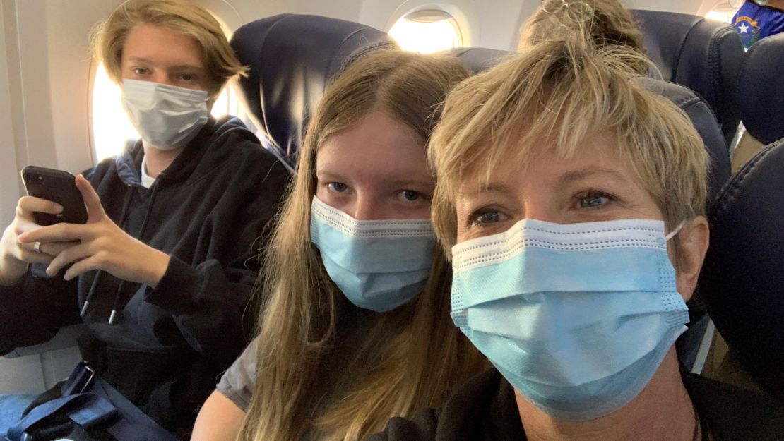 Stephanie Scherrer was on a flight with her two kids when she saw passengers removed from the airplane for refusing to wear masks.