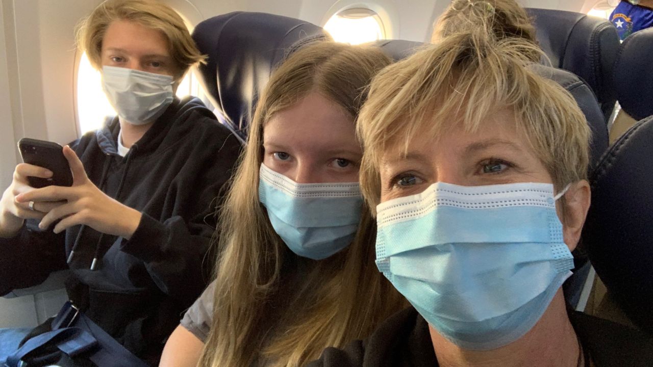Stephanie Scherrer was on a flight with her two kids when she saw passengers removed from the airplane for refusing to wear masks.