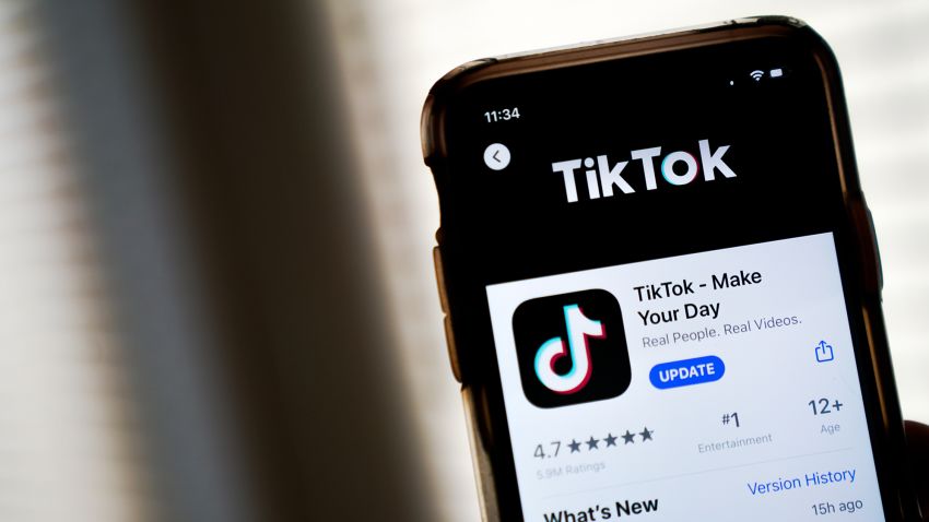 In this photo illustration, the download page for the TikTok app is displayed on an Apple iPhone on August 7, 2020 in Washington, DC. On Thursday evening, President Donald Trump signed an executive order that bans any transactions between the parent company of TikTok, ByteDance, and U.S. citizens due to national security reasons. The president signed a separate executive order banning transactions with China-based tech company Tencent, which owns the app WeChat. Both orders are set to take effect in 45 days. (Photo Illustration by Drew Angerer/Getty Images)