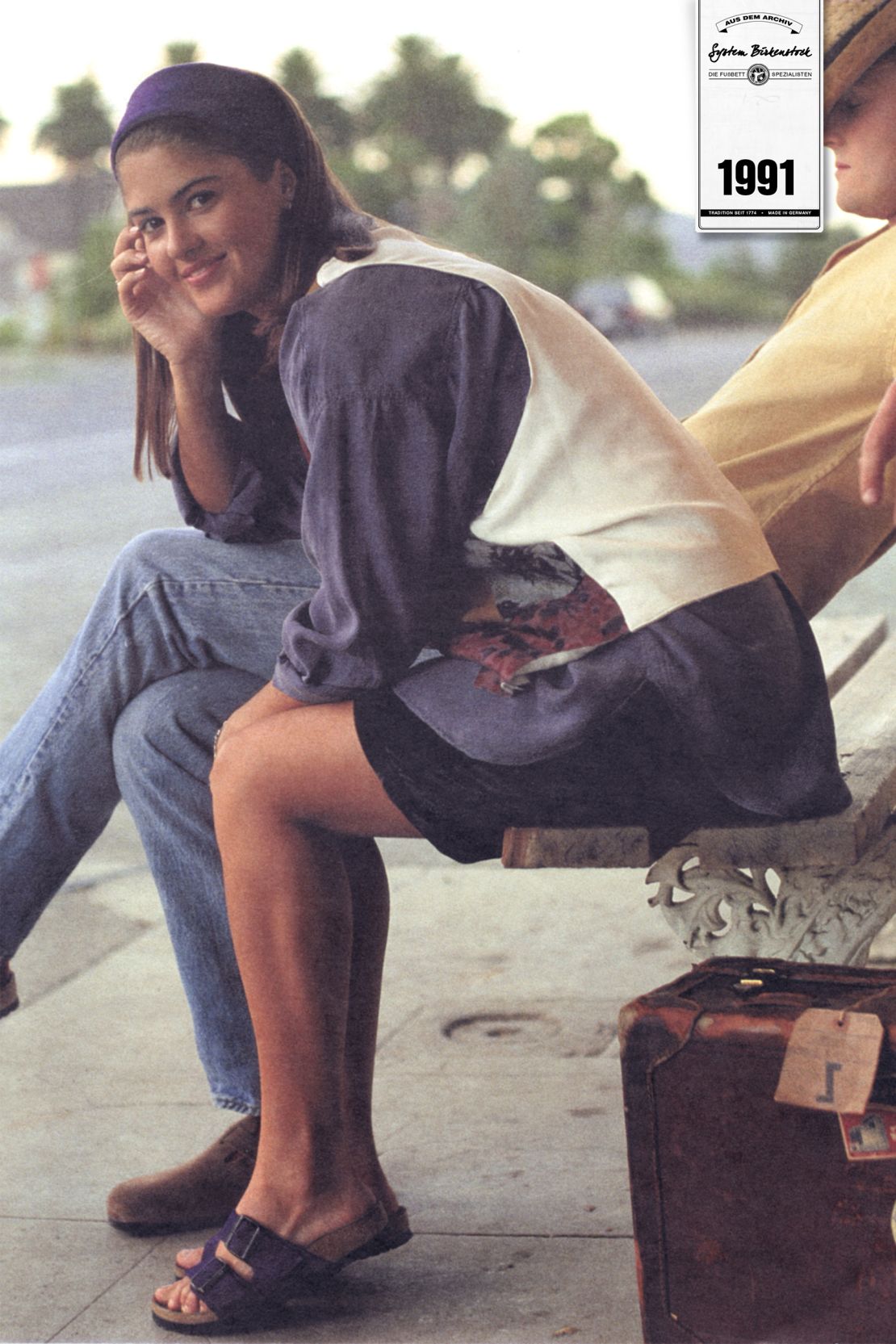 A model wears the classic two-strap Arizona sandal for a Birkenstock poster, 1991
