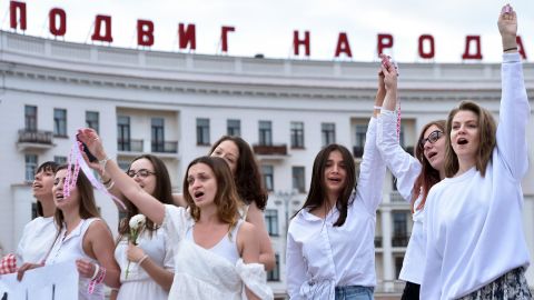 Women dressed in white protest against police violence during recent rallies against the election results, which many say were rigged.