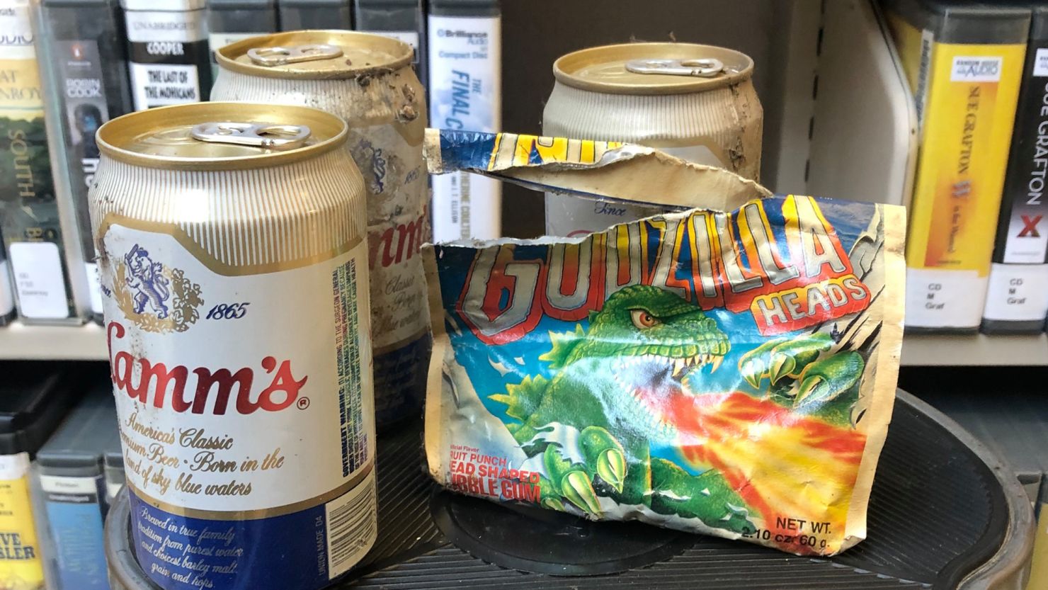 A stash of beer and gum dating back to the 1980s was found behind the shelves of a Washington library. 