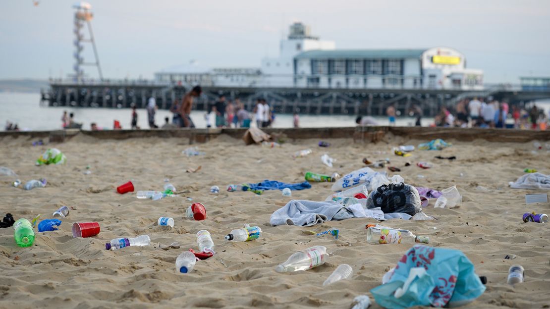 Trash left on the beach at Bournemouth after a busy day.