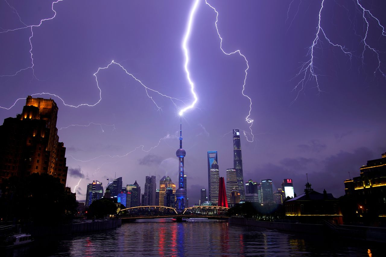 Lightning is seen above the Pudong financial district in Shanghai, China, on Monday, August 10.